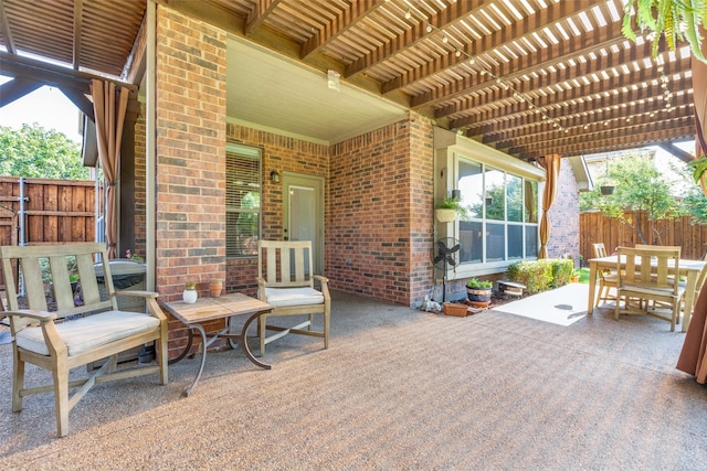 view of patio with fence and a pergola