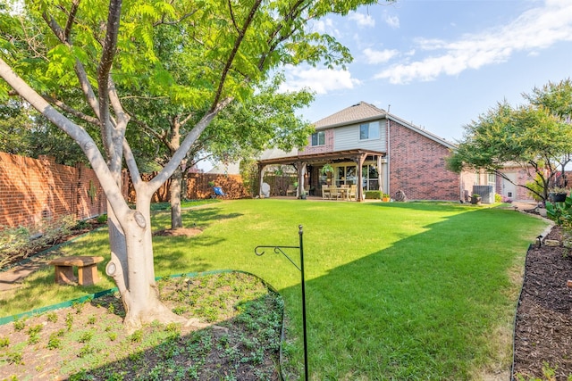 view of yard with a patio, a pergola, and a fenced backyard