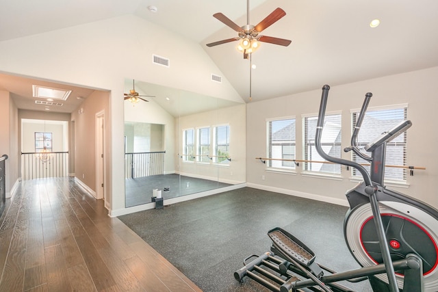 workout area with visible vents, baseboards, high vaulted ceiling, and ceiling fan