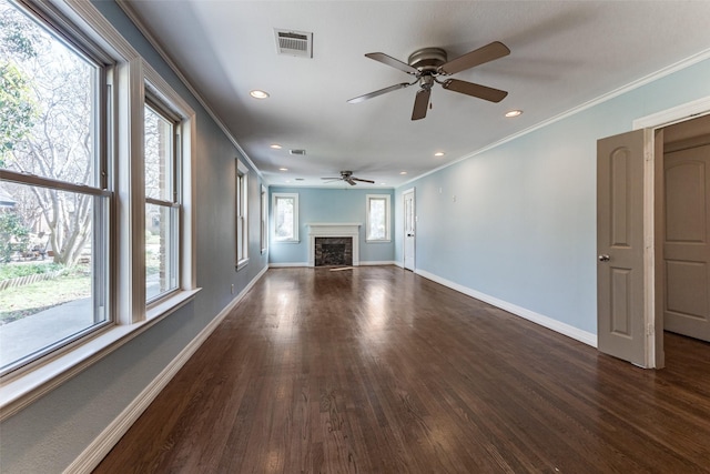 unfurnished living room featuring a ceiling fan, baseboards, visible vents, dark wood-style flooring, and ornamental molding