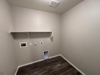 washroom with wood finished floors, baseboards, visible vents, laundry area, and electric dryer hookup