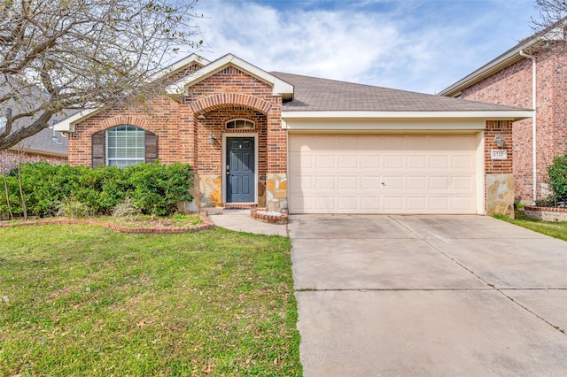 single story home featuring a front yard, roof with shingles, concrete driveway, a garage, and brick siding