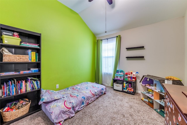 carpeted bedroom featuring vaulted ceiling and ceiling fan