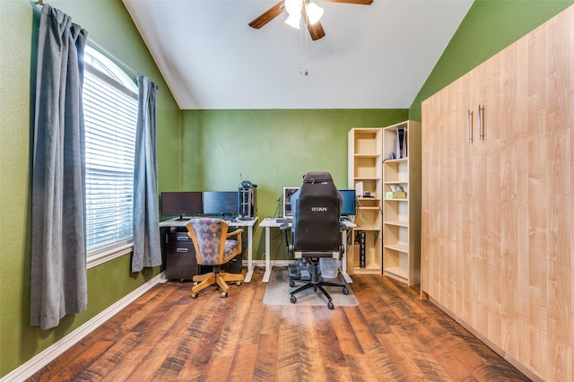 office area with baseboards, wood finished floors, ceiling fan, and vaulted ceiling