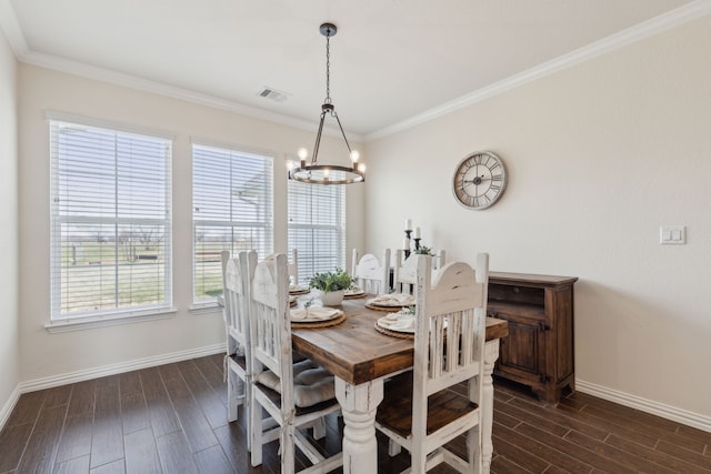 dining area with a chandelier, visible vents, plenty of natural light, and wood tiled floor