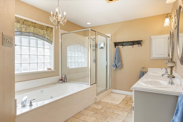 5710 Nutcracker Dr, Granbury, TX 76049 - full bathroom with a garden tub, a shower stall, a chandelier, and double vanity