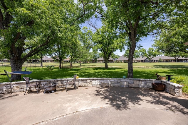 5710 Nutcracker Dr, Granbury, TX 76049 - view of patio / terrace with a fire pit
