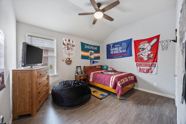 bedroom with vaulted ceiling, baseboards, a ceiling fan, and wood finished floors