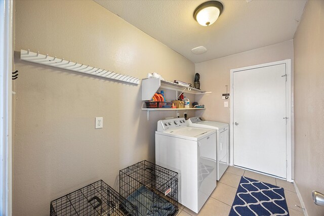 308 Highland Meadows Dr, Wylie, TX 75098 - clothes washing area featuring washing machine and dryer and light tile patterned flooring