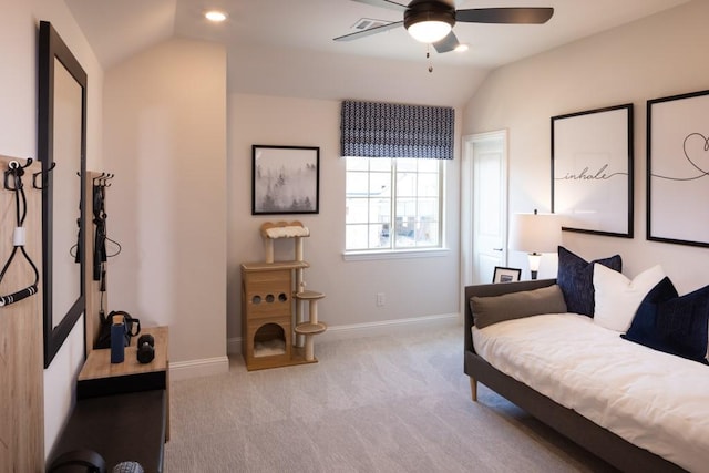 living room with vaulted ceiling, a ceiling fan, light colored carpet, and baseboards