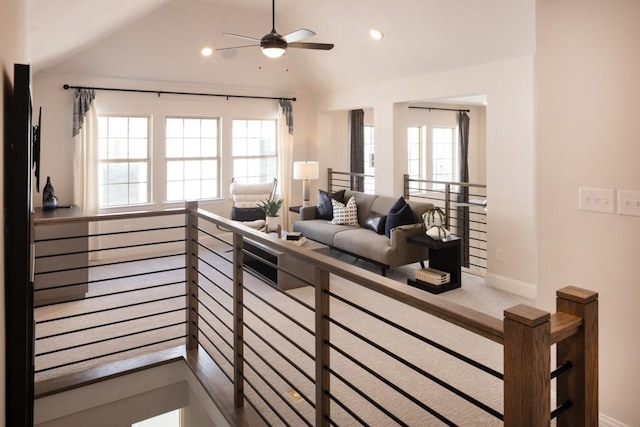 kitchen featuring vaulted ceiling, recessed lighting, baseboards, and ceiling fan