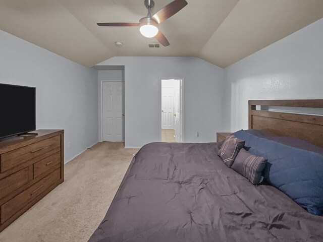 8828 King Ranch Dr, Cross Roads, TX 76227 - bedroom featuring lofted ceiling, light carpet, connected bathroom, and a ceiling fan