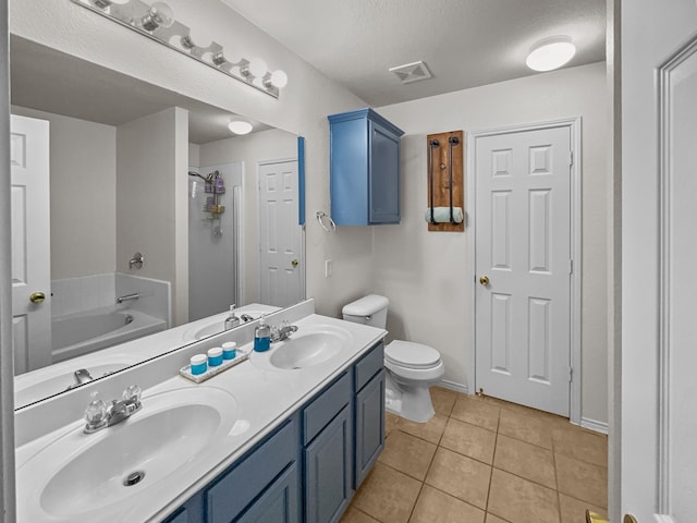 8828 King Ranch Dr, Cross Roads, TX 76227 - full bathroom with a bath, double vanity, tile patterned floors, toilet, and a shower