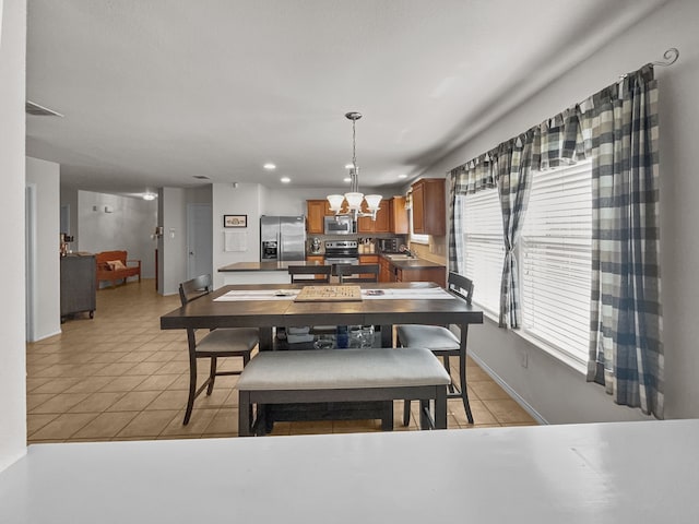8828 King Ranch Dr, Cross Roads, TX 76227 - dining room with a chandelier, light tile patterned floors, recessed lighting, and baseboards