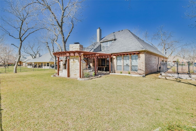 rear view of property featuring fence, a pergola, a chimney, a patio area, and a lawn