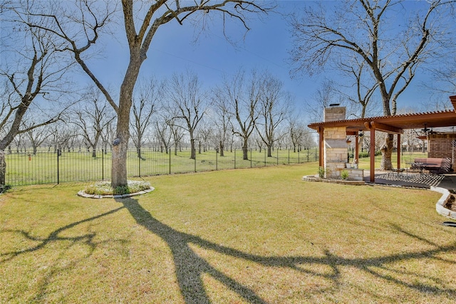 view of yard featuring a patio and fence