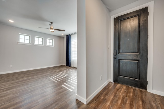 entrance foyer featuring plenty of natural light, wood finished floors, baseboards, and ceiling fan