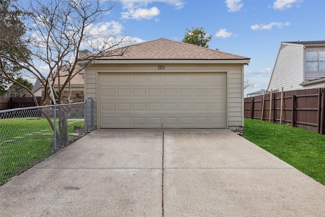 detached garage with fence