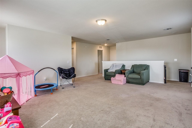 playroom featuring visible vents, carpet flooring, and baseboards