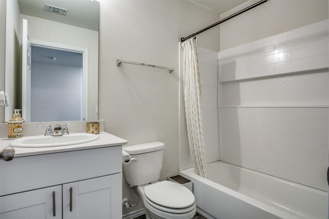 full bathroom featuring visible vents, toilet, vanity, and shower / tub combo with curtain