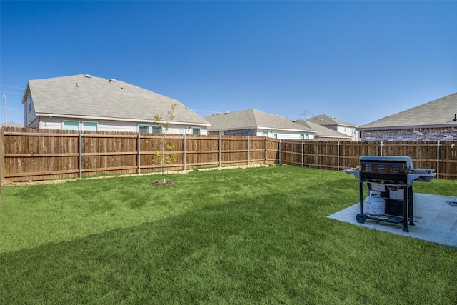 view of yard featuring a fenced backyard