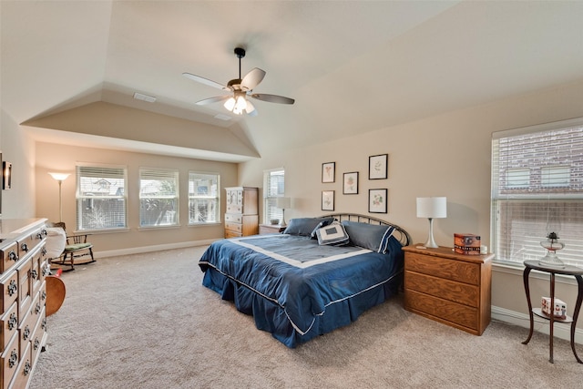 bedroom featuring visible vents, carpet floors, baseboards, and vaulted ceiling