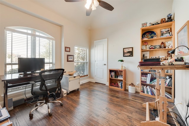 home office featuring ceiling fan, baseboards, and wood finished floors