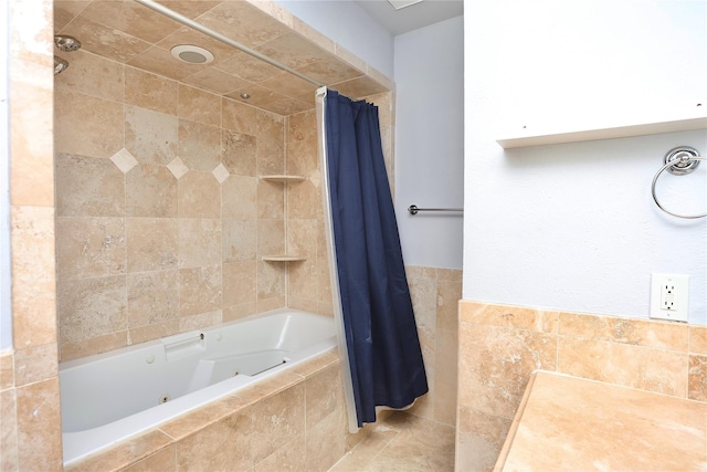 bathroom featuring tile walls and a combined bath / shower with jetted tub