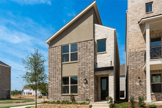 4301 Ruth Rd, North Richland Hills, TX 76180 - view of front of house featuring brick siding and stucco siding