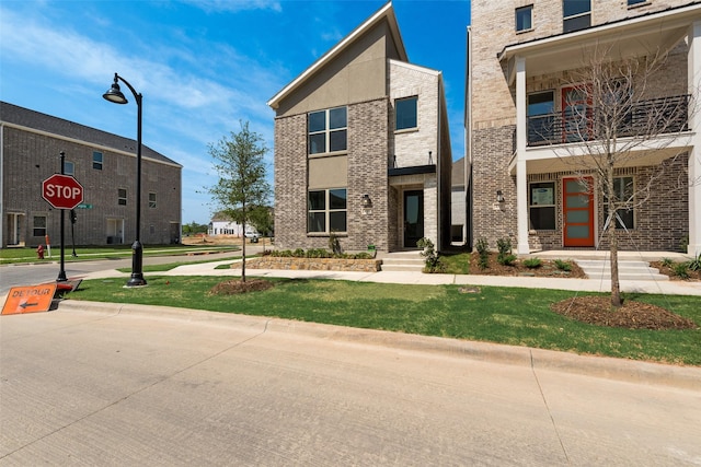 4301 Ruth Rd, North Richland Hills, TX 76180 - contemporary house featuring a front lawn and brick siding