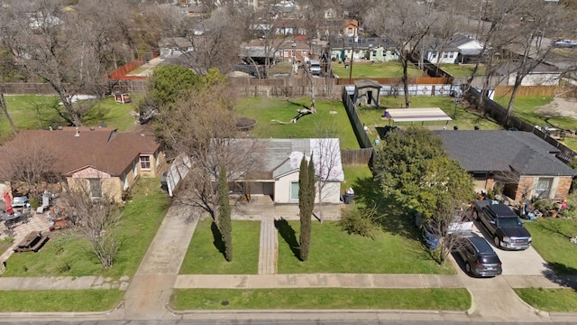 birds eye view of property with a residential view