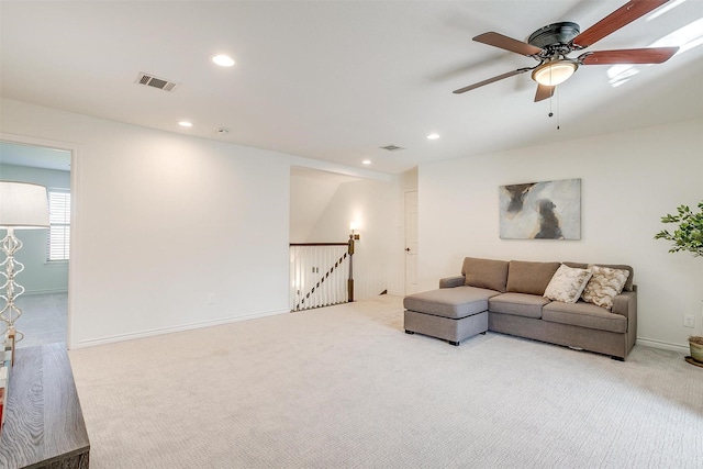 living area featuring visible vents, recessed lighting, carpet flooring, baseboards, and ceiling fan