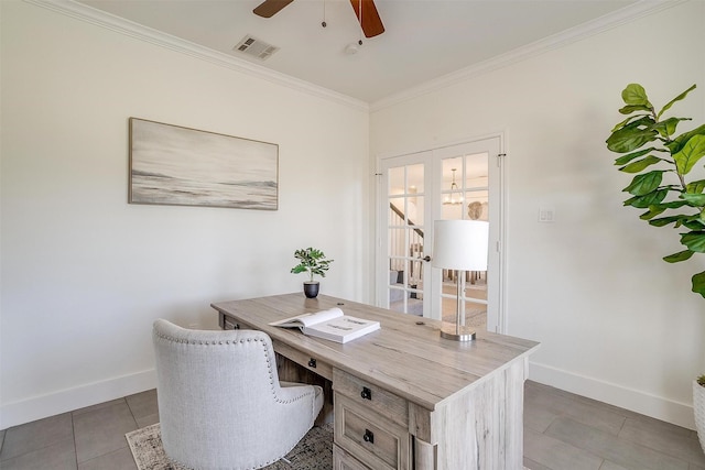 office space with visible vents, baseboards, ceiling fan, and ornamental molding