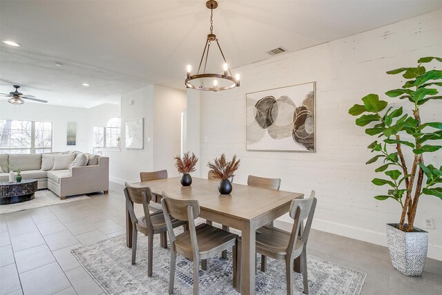 tiled dining room with recessed lighting, visible vents, baseboards, and ceiling fan with notable chandelier