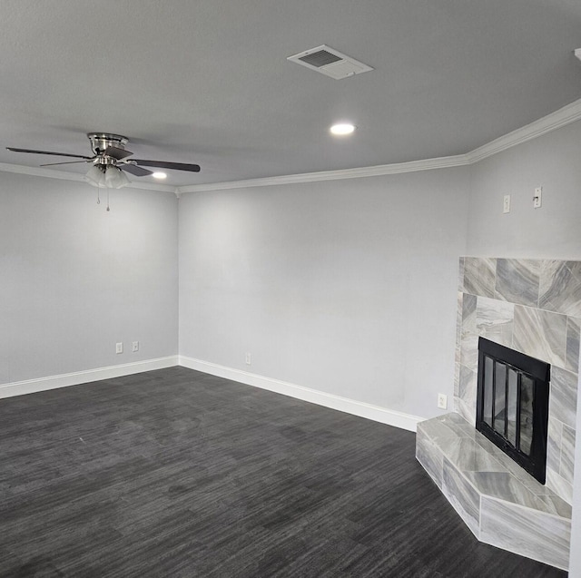 unfurnished living room featuring visible vents, baseboards, ornamental molding, dark wood-style floors, and a ceiling fan