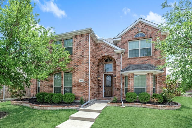 3506 Edinburgh Dr, Sachse, TX 75048 - traditional-style house featuring a front lawn and brick siding