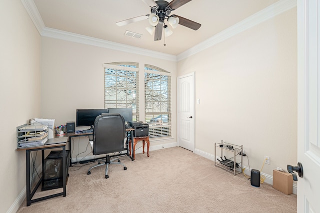 carpeted office with visible vents, baseboards, a ceiling fan, and ornamental molding