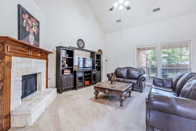 3506 Edinburgh Dr, Sachse, TX 75048 - living area with high vaulted ceiling, a ceiling fan, light colored carpet, and a fireplace