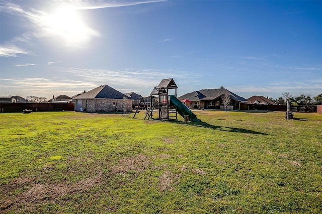 view of yard with a playground