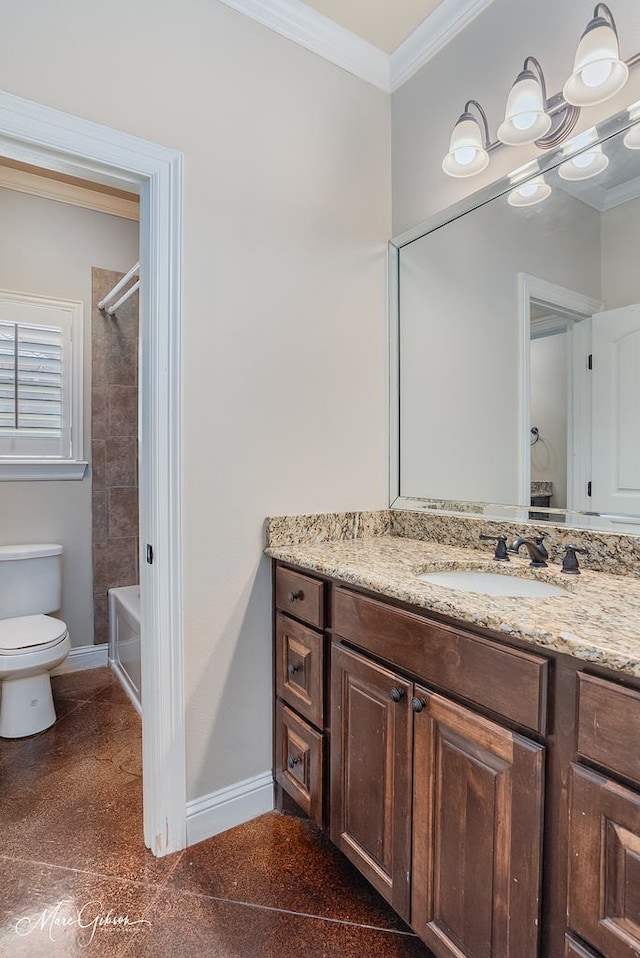 full bath featuring vanity, toilet, crown molding, and baseboards