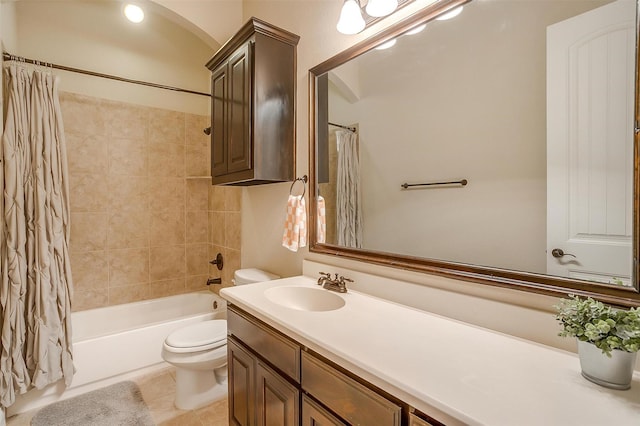 full bath with tile patterned floors, shower / bath combination with curtain, toilet, and vanity