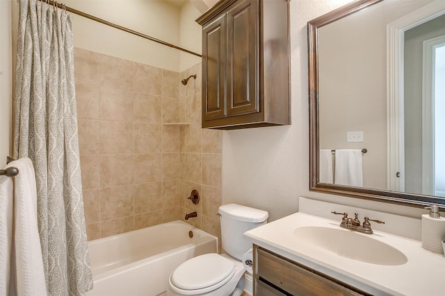 bathroom with vanity, toilet, and shower / bath combo