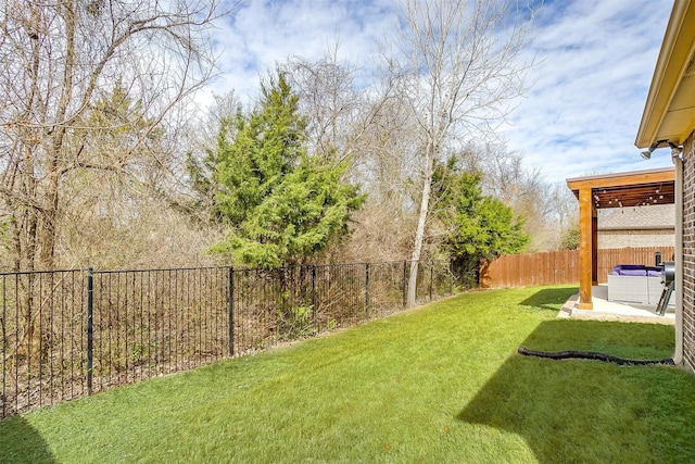 view of yard with a patio, an outdoor hangout area, and a fenced backyard