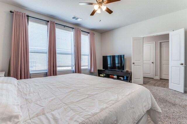 1521 Addison Dr, Lancaster, TX 75134 - carpeted bedroom with a ceiling fan and visible vents