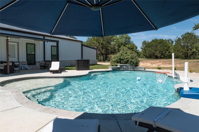 outdoor pool featuring a patio