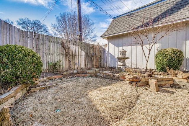 view of yard featuring a fenced backyard