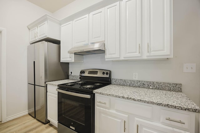 kitchen featuring light stone countertops, under cabinet range hood, light wood-type flooring, appliances with stainless steel finishes, and white cabinetry