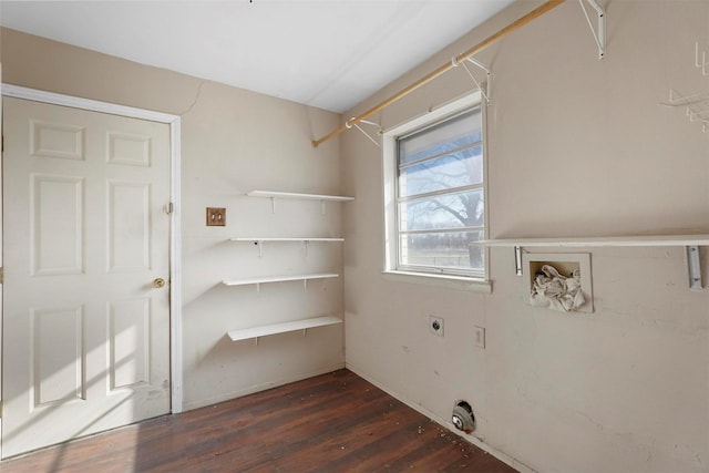 laundry room with laundry area, hookup for a washing machine, electric dryer hookup, and dark wood-style flooring