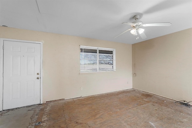 unfurnished room featuring a ceiling fan