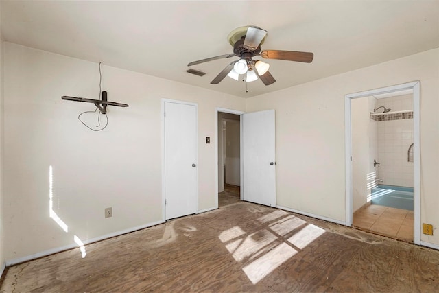 unfurnished bedroom with visible vents, ensuite bath, and ceiling fan